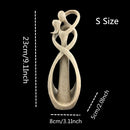 Escultura Abstrata de Casal Beijando em Resina