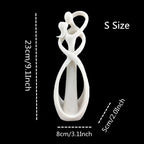 Escultura Abstrata de Casal Beijando em Resina